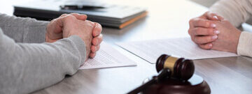 couple with divorce papers and gavel