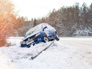 car off the road in winter storm