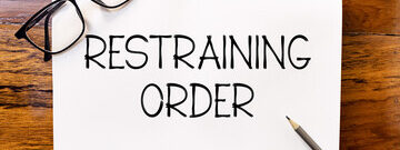 paper that says restraining order